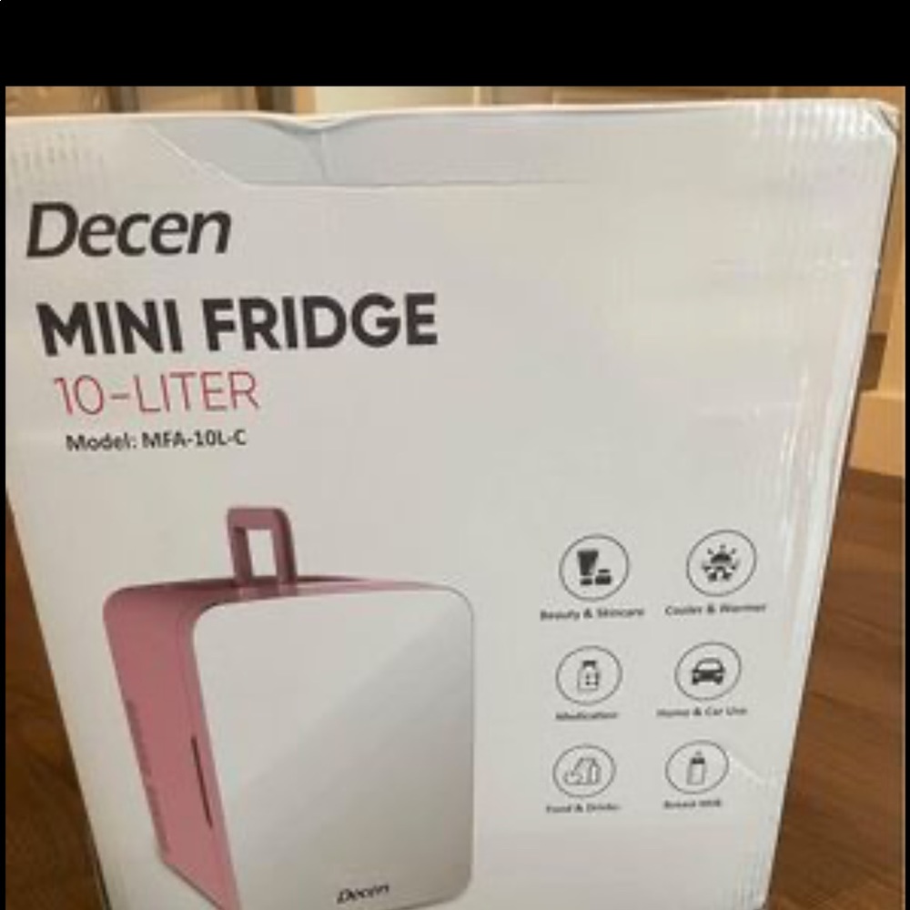 Pink mini fridge, great for cosmetics!